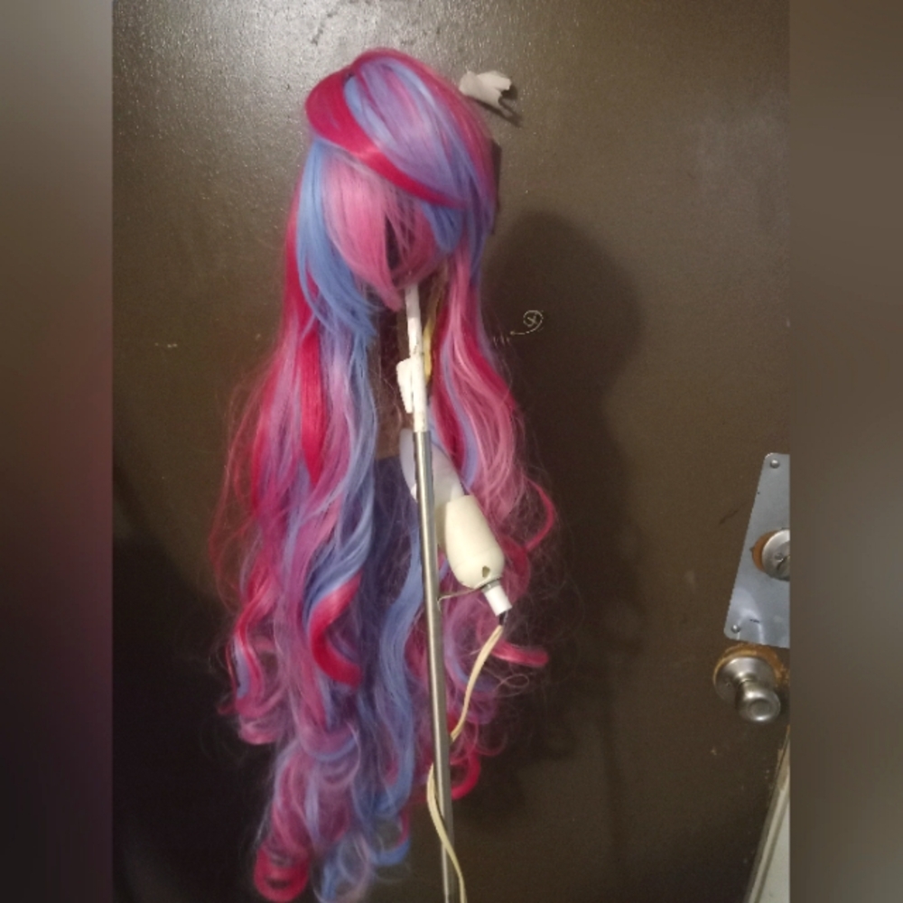 Pink and blue wig with two pony tail claws accessories